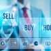 Stock Markets Finish Mixed as Warren Buffett Makes 2 Big Buys