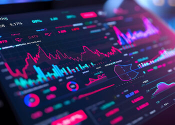 A vibrant, multicolored trading software interface displays various financial charts and graphs. Line and bar charts, along with numerical data, illustrate stock performance, price changes, and market trends against a dark background. | ZIIMP